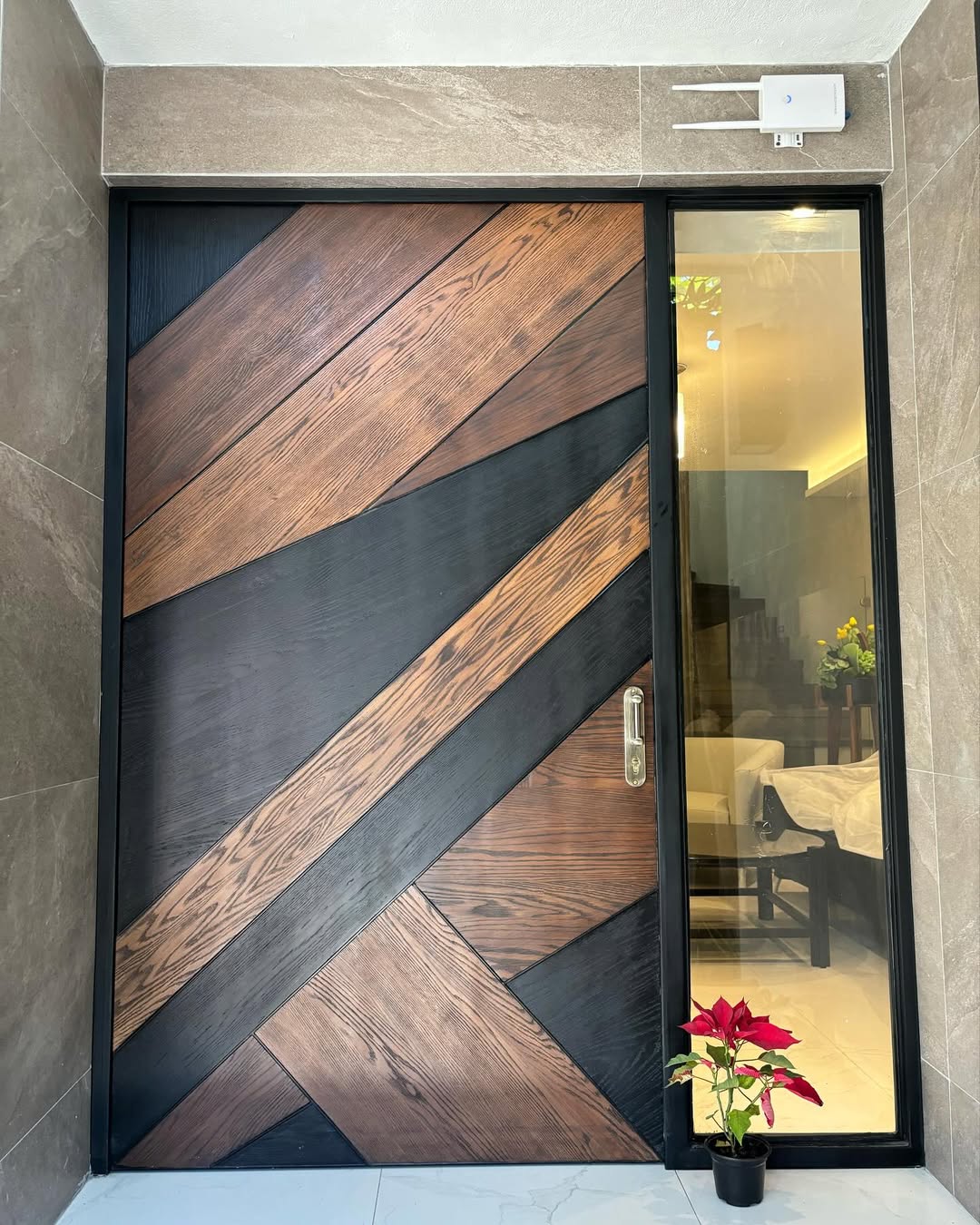 Custom solid oak entry door with diagonal geometric wood grain pattern